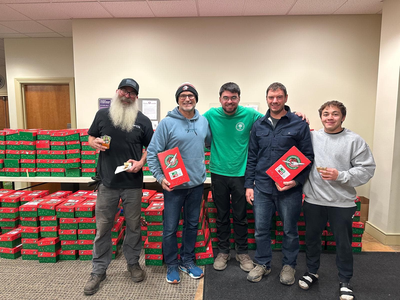 Joe Hoag and volunteers with Samaritan's Purse gift boxes in the USA